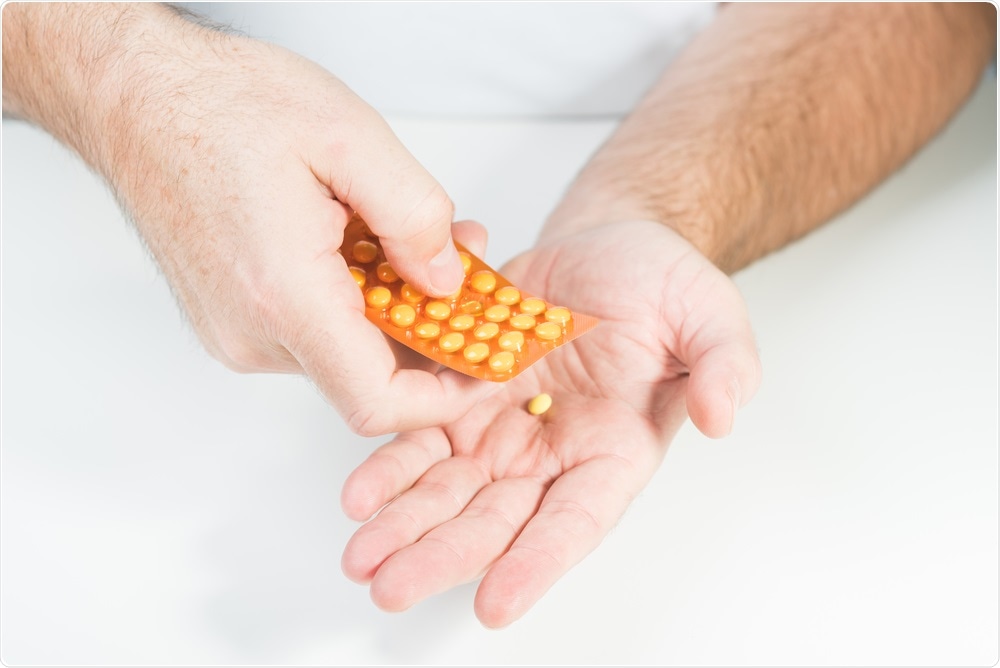 The male contraceptive pill has been shown to be safe - picture shows man taking pills