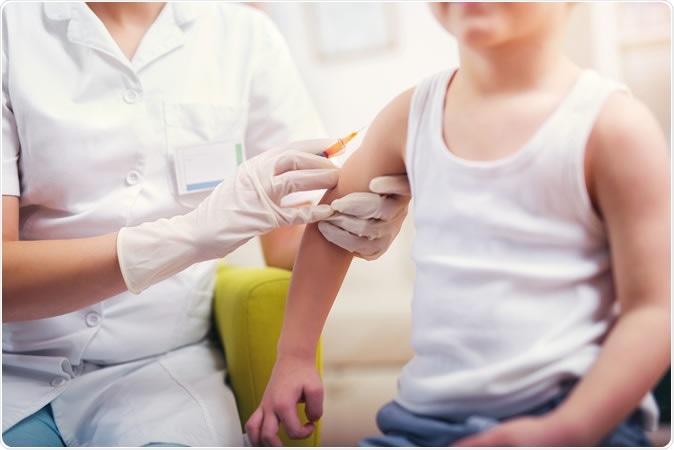 Pediatrician performing routine vaccination. Image Credit: adriaticfoto / Shutterstock