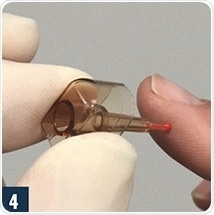 Touch sampler to blood.