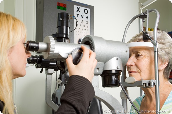 Older lady eyesight test at opticians