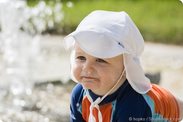 Baby Boy with Good Sun Protection on the Beach in Mexico