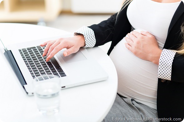Pregnant woman on laptop