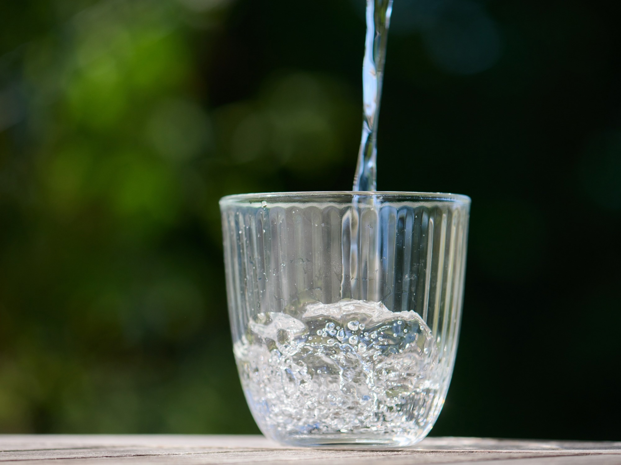 Clean drinking water, tap water, poured into glass, H2O, pfas, pure, clear.