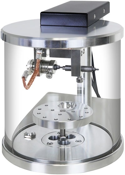 Sample chamber with Ø63mm height adjustable stage.