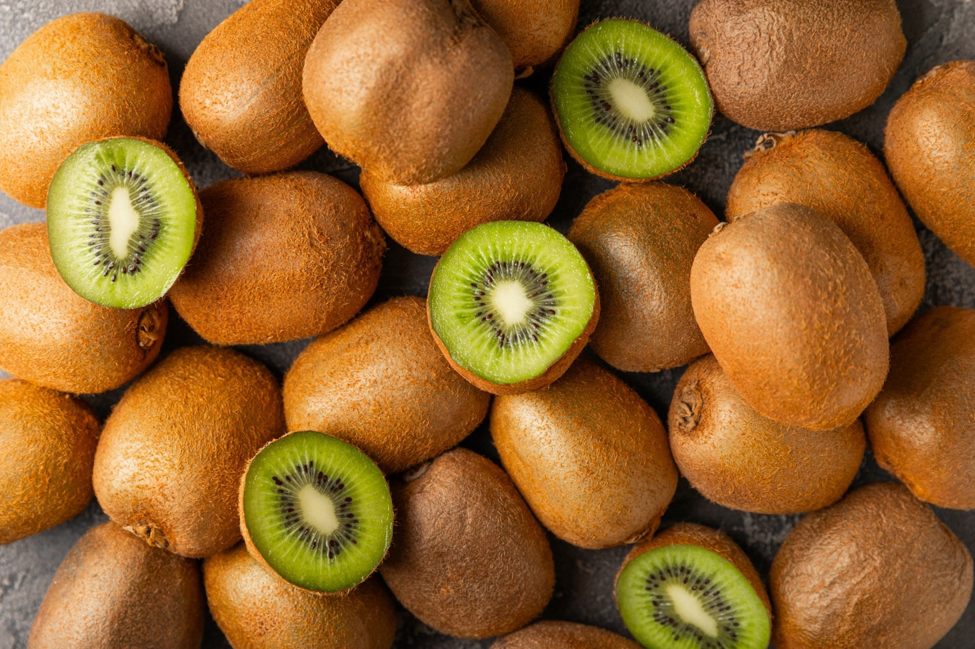 Kiwi on wooden background